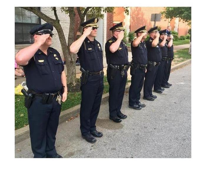 Police Officers Saluting